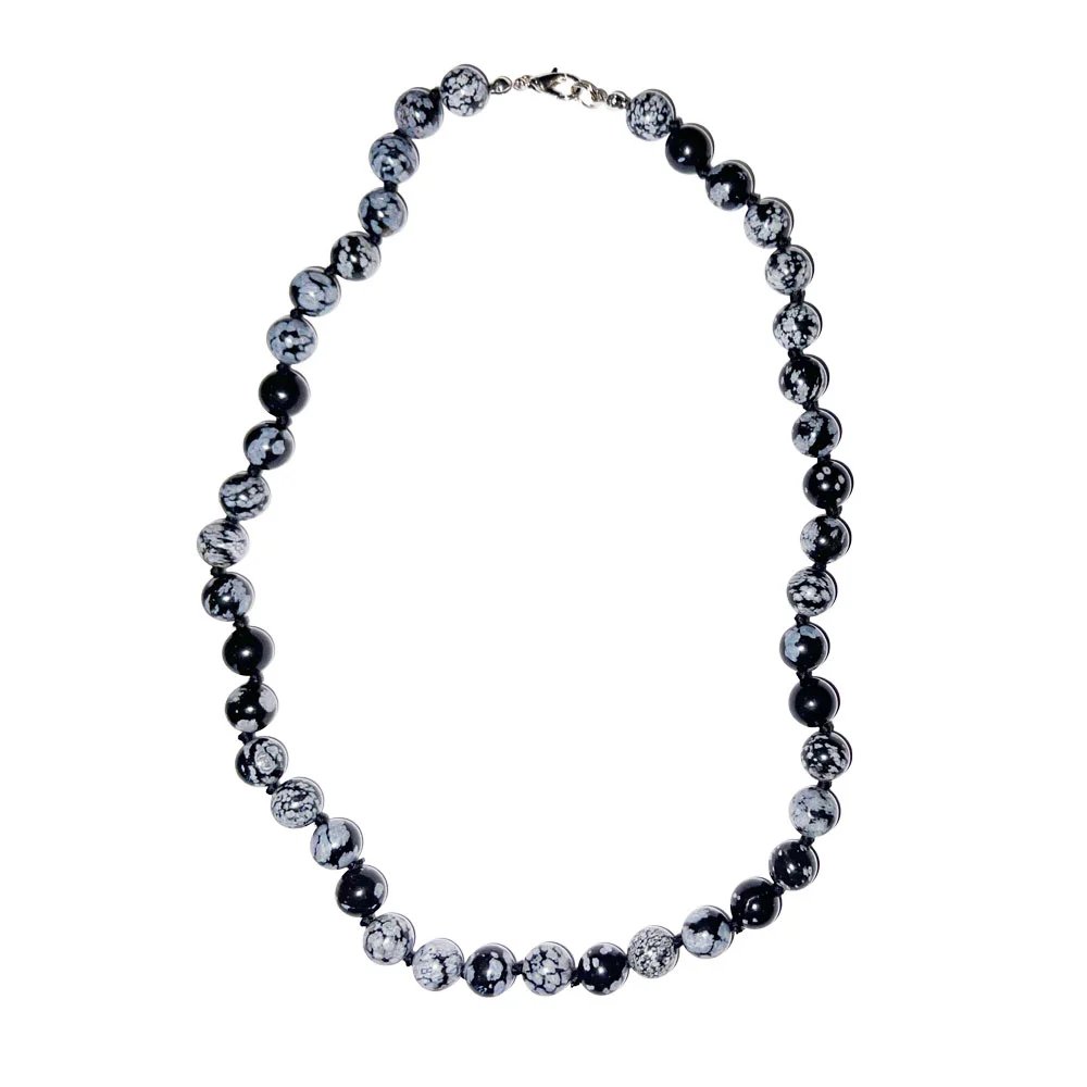 A necklace of snowflake obsidian beads, black with grey-white flecks