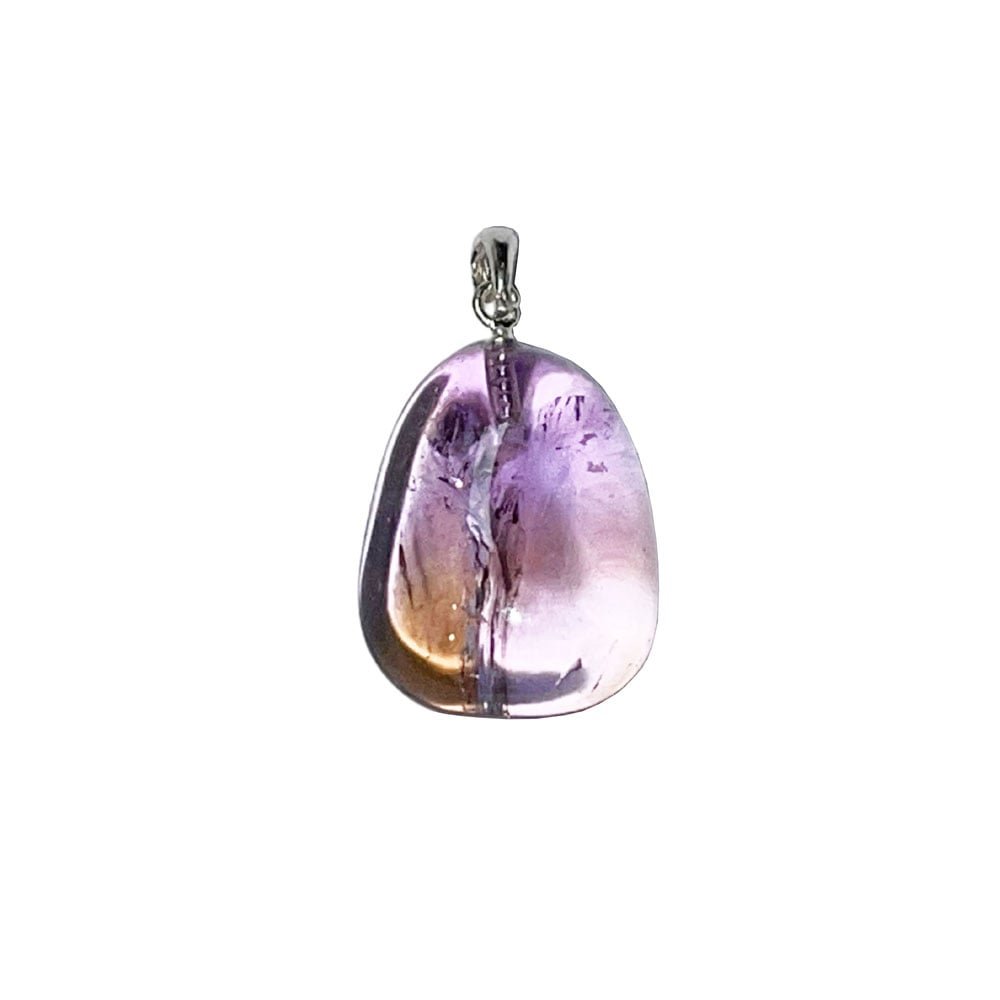 A tumbled ametrine stone showing both purple amethyst and golden citrine zones