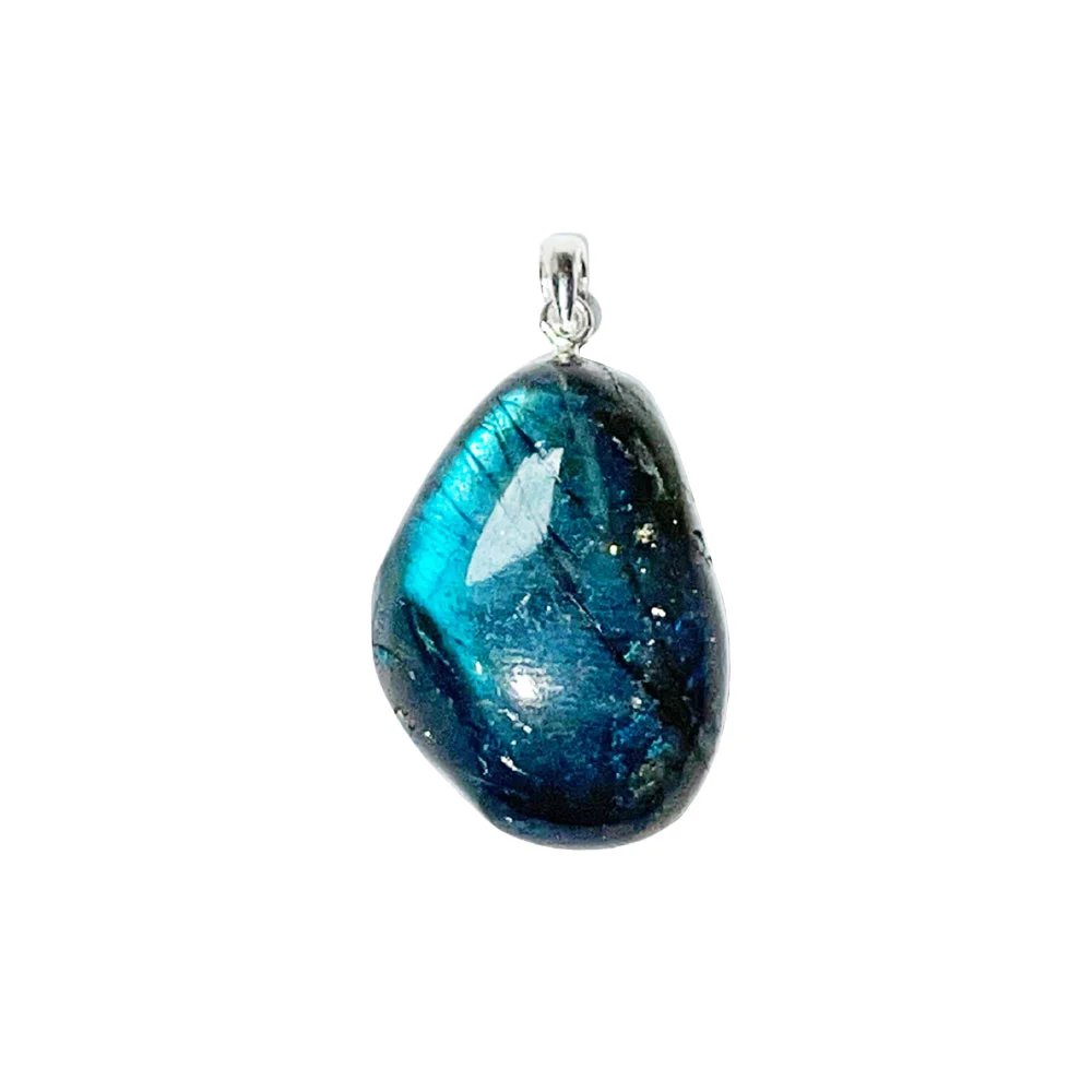 A polished labradorite pendant flashing blue and green labradorescence