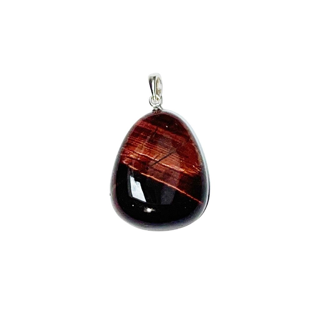 A tumbled red tiger's eye stone, also called ox eye or bull's eye, in a silver pendant