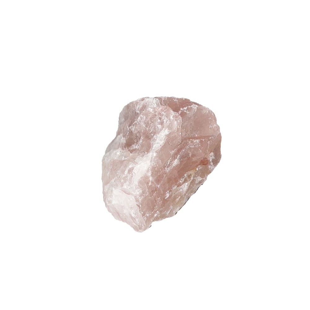 A natural raw rose quartz stone in soft pink