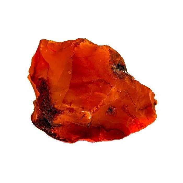 Polished orange-red carnelian stones with warm, glowing colour