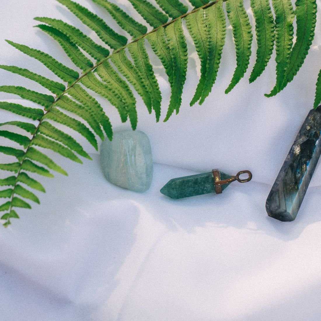 A pale blue-green aquamarine beryl crystal