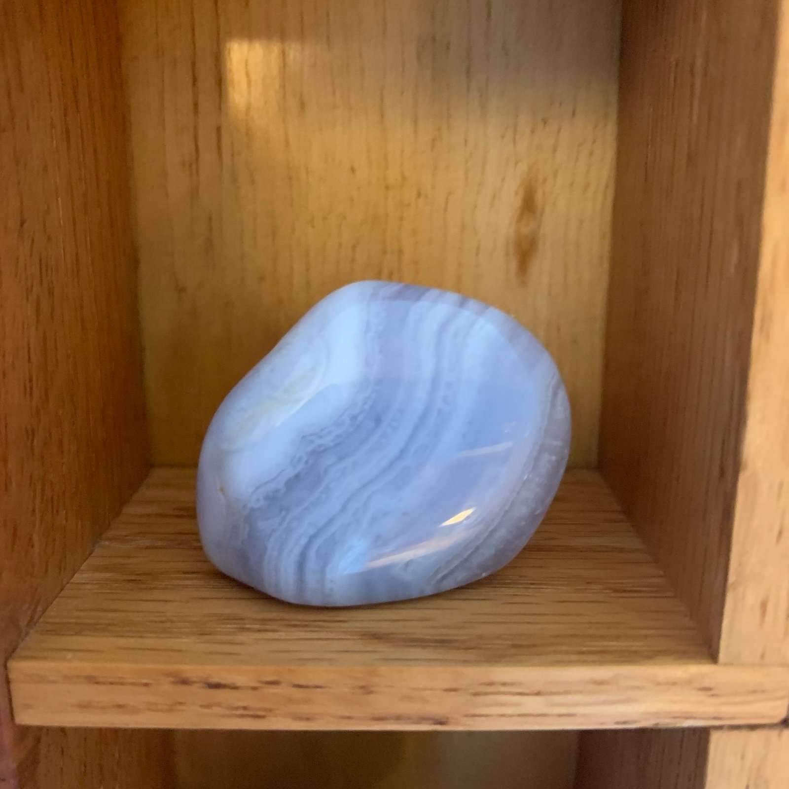 Polished blue lace agate with soft banded blue and white layers