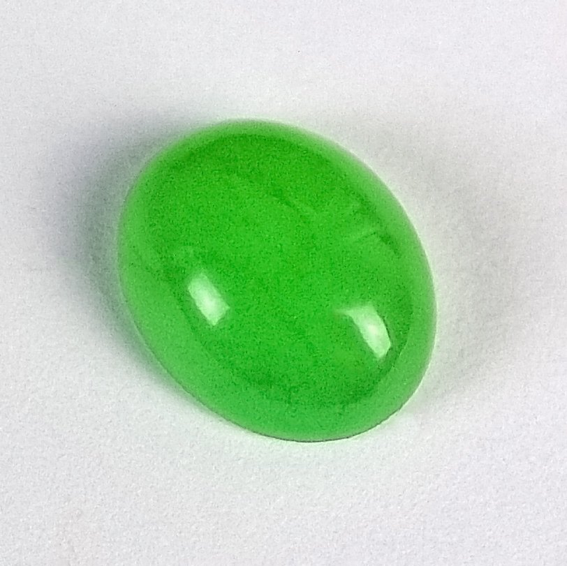 Apple-green chrysoprase cabochon, nickel-coloured chalcedony