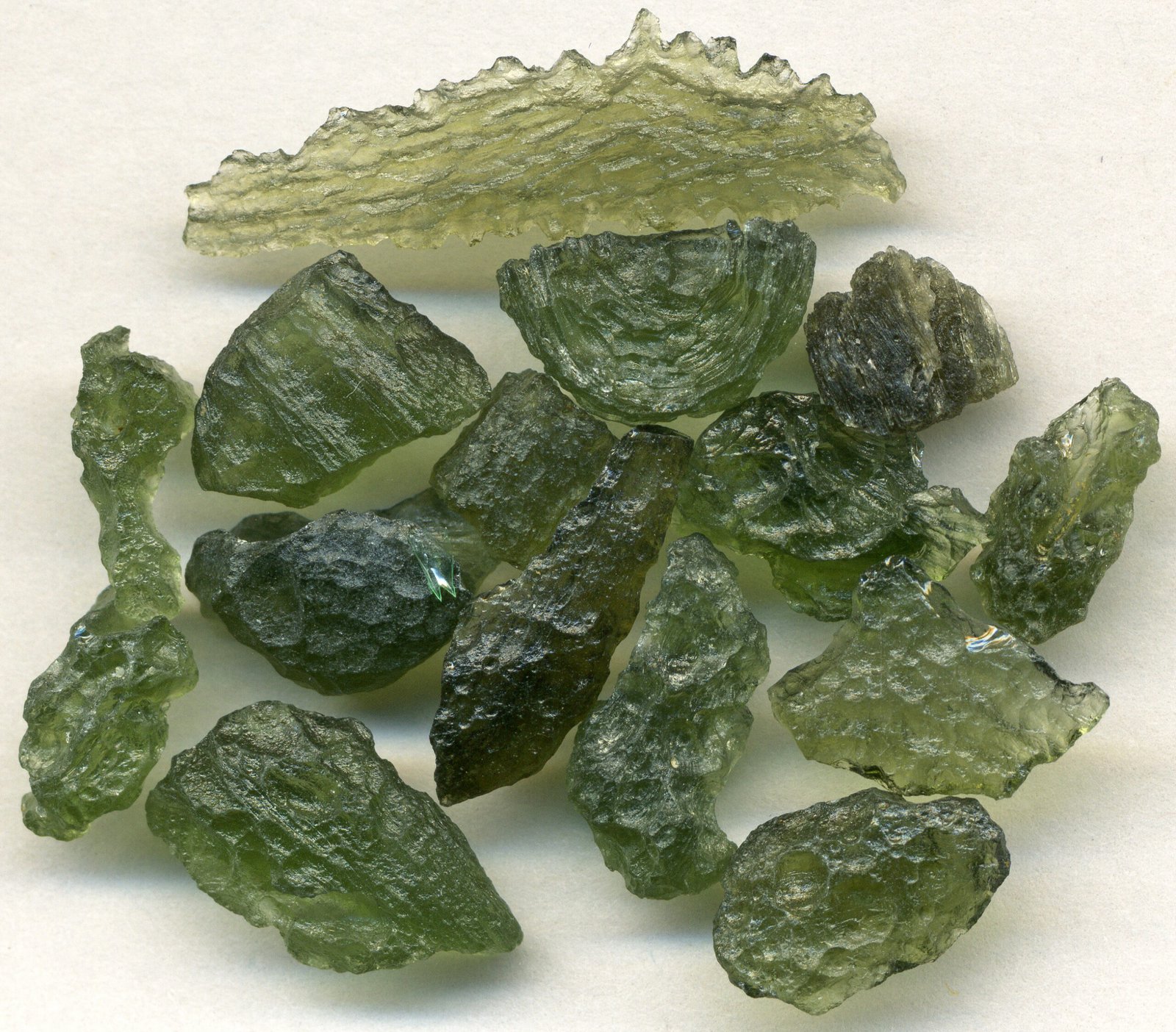 Raw moldavite tektite showing its etched, wrinkled mossy-green surface, from the Czech Republic