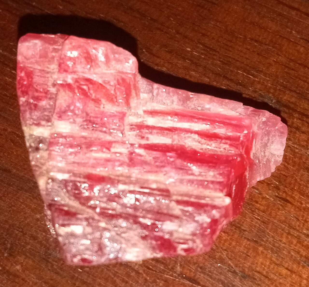Rough pink rhodonite veined with black manganese oxide