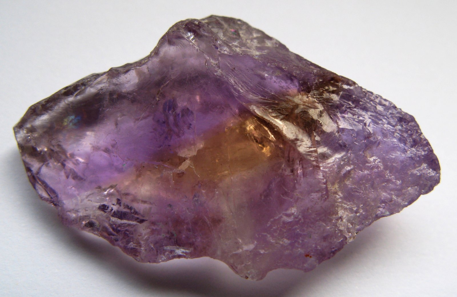 A natural ametrine crystal from Bolivia with purple amethyst and golden citrine zones