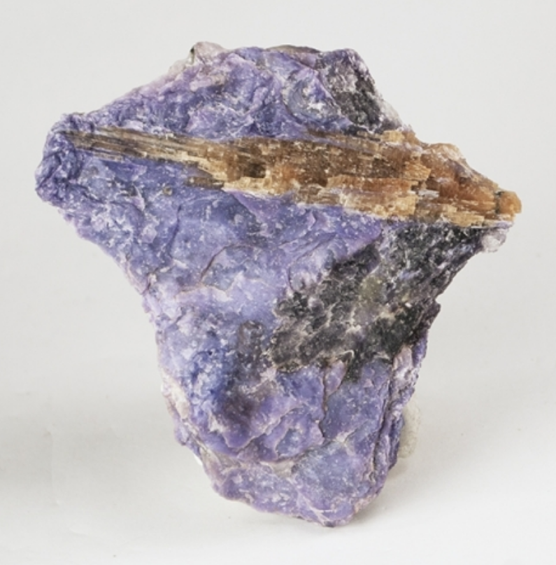 Lilac-purple charoite specimen with tinaksite from Russia